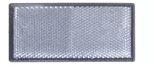 Catadióptrico adhesivo rectangular contorno negro de 105x48 mm color blanco para señalización.